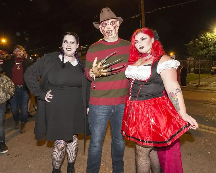 A group of friends in Halloween costumes