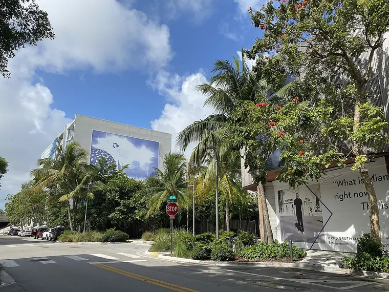 A palm-lined street of designer stores in the Miami Design District